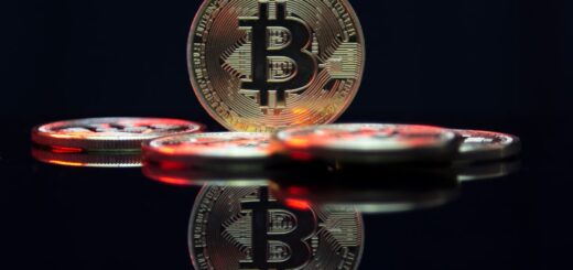 a bit coin sitting on top of a table