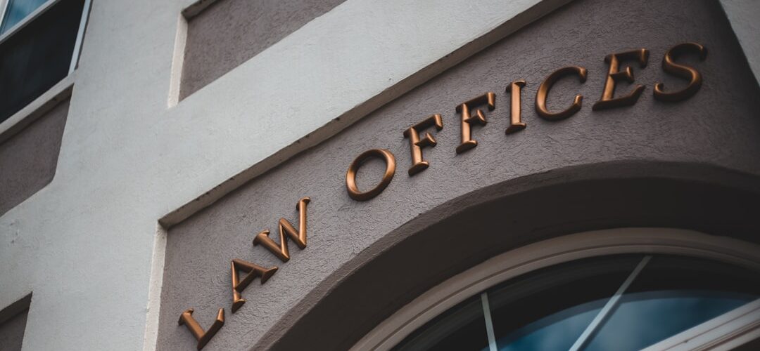 a law office sign on the side of a building