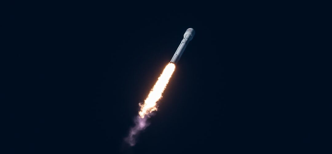 spacecraft flying through the sky