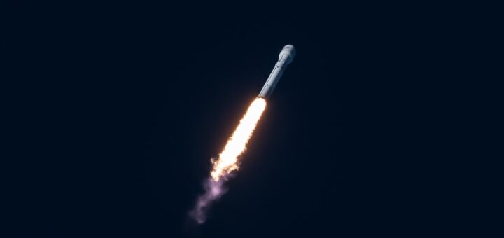 spacecraft flying through the sky