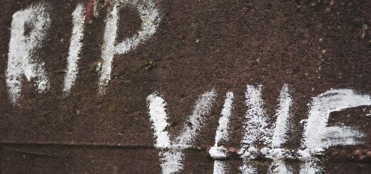 text on brown concrete floor