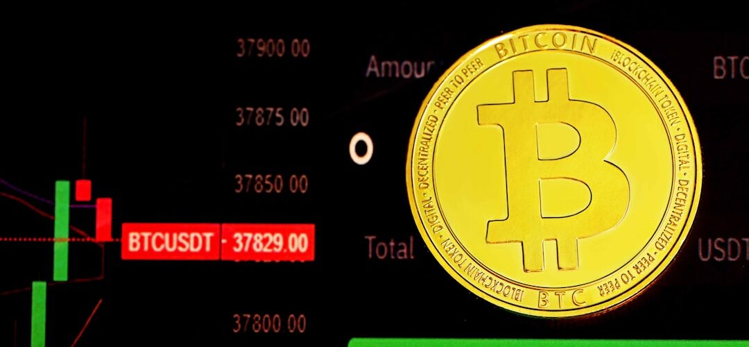 gold and black round logo