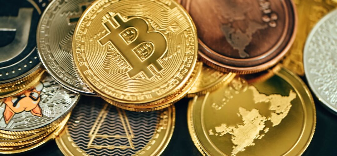 a pile of gold and silver bitcoins