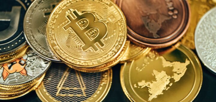 a pile of gold and silver bitcoins
