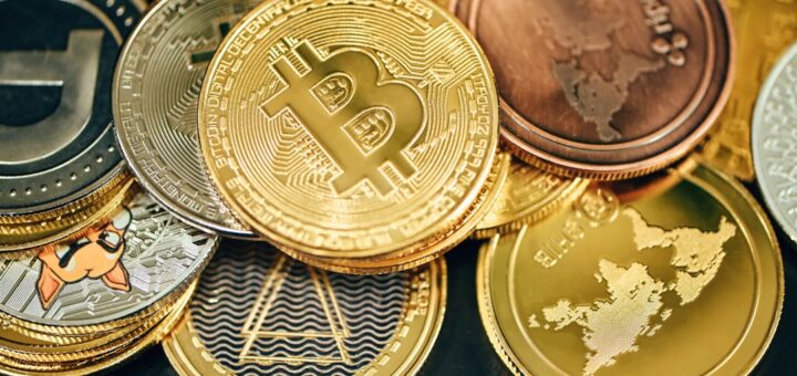 a pile of gold and silver bitcoins
